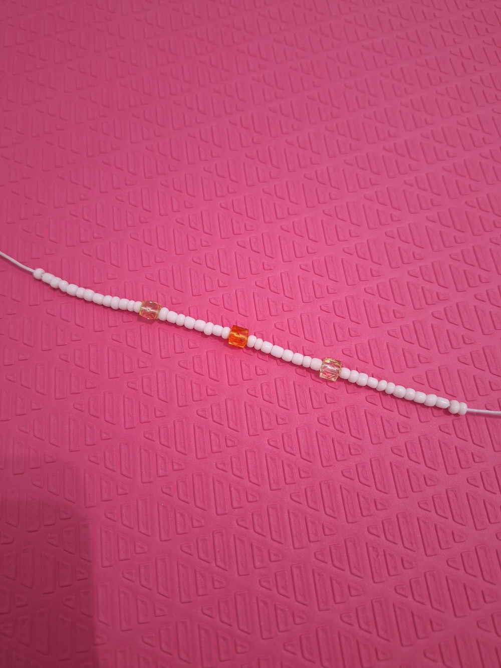 Accessorize White Bead Bracelet with Orange Accent Beads
